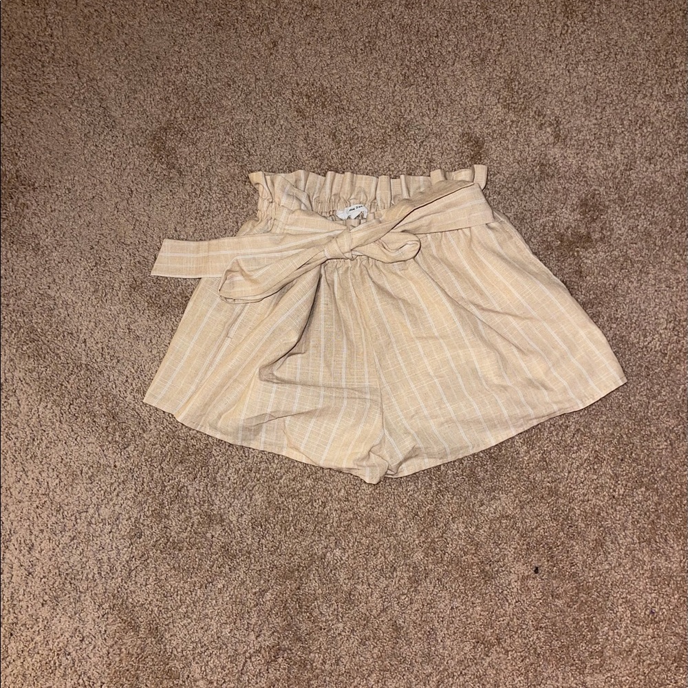 cream and white stripped paper bag shorts
